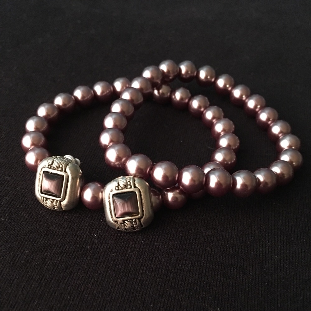 Matching bracelets and a pair of earrings.
